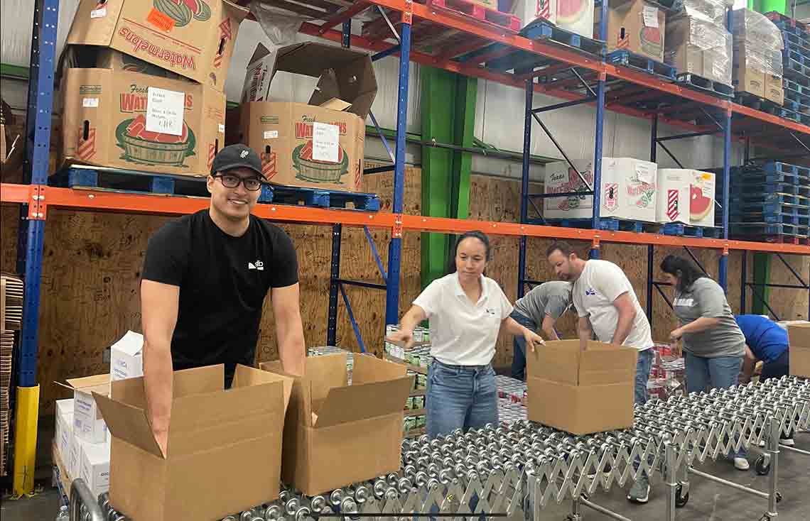 Photo of SLB employees in the Permian volunteering at a local food bank.