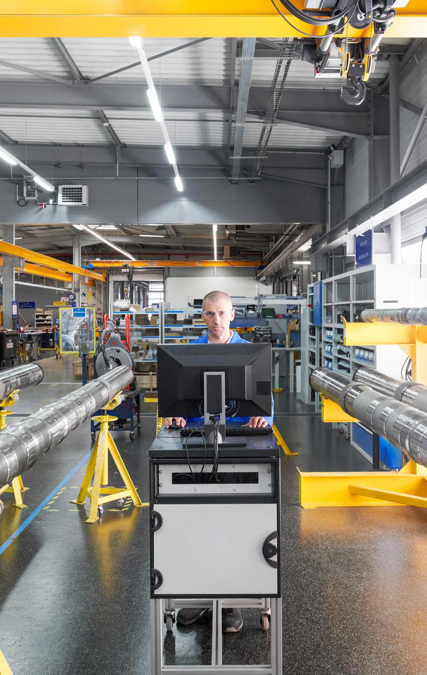Man in front of a computer station
