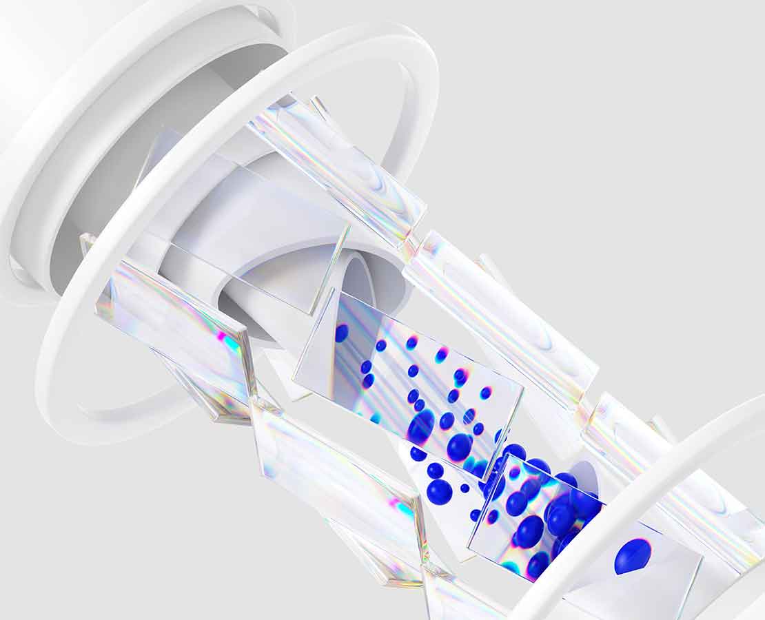 Artwork showing a cutaway view of a white cylinder with blue bubbles rising inside.