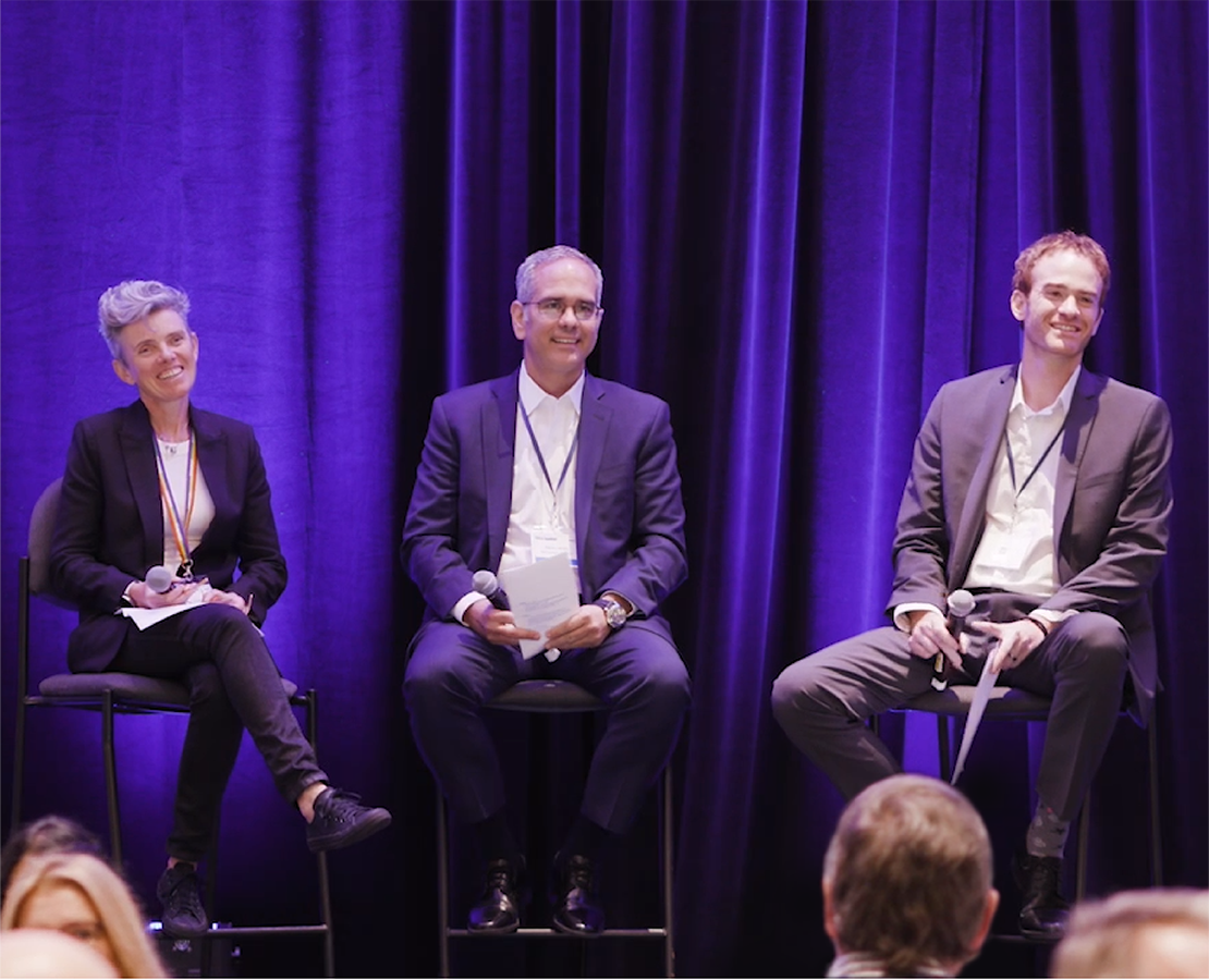 Schlumberger leaders presenting on stage