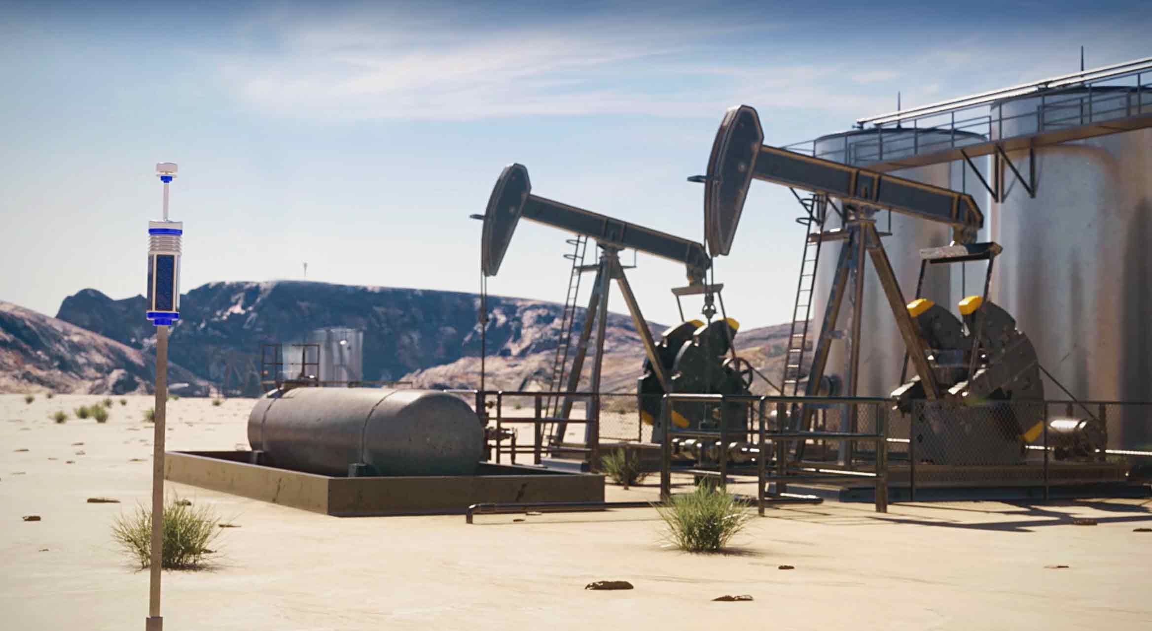Well site with pump jacks, storage tanks and methane monitoring tech