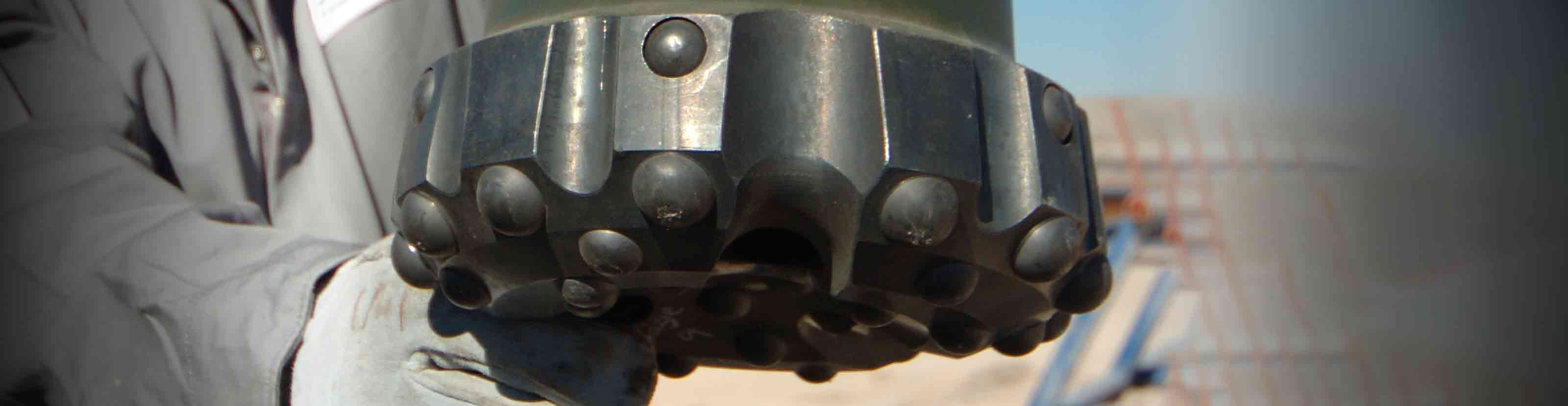 Driller guiding hammer bit downhole