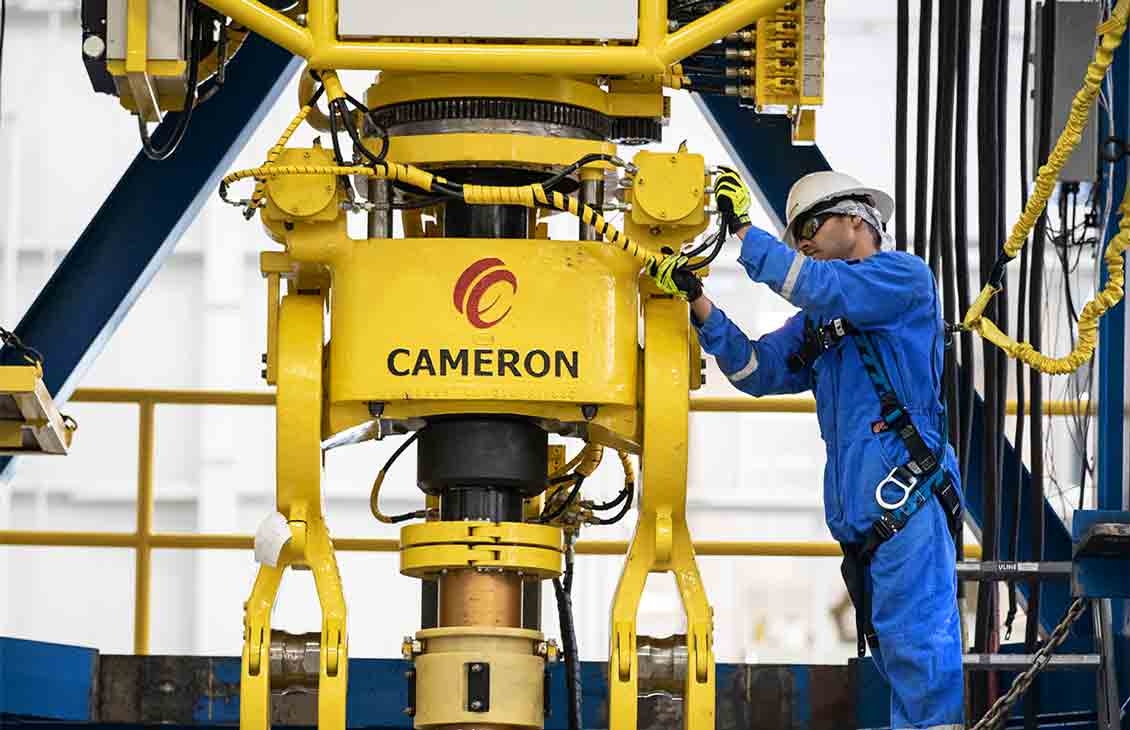 Cameron operator working on a topdrive