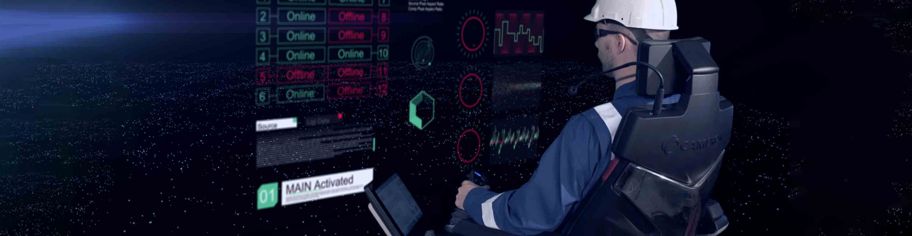 Operator sitting tin the X-COM operator chair