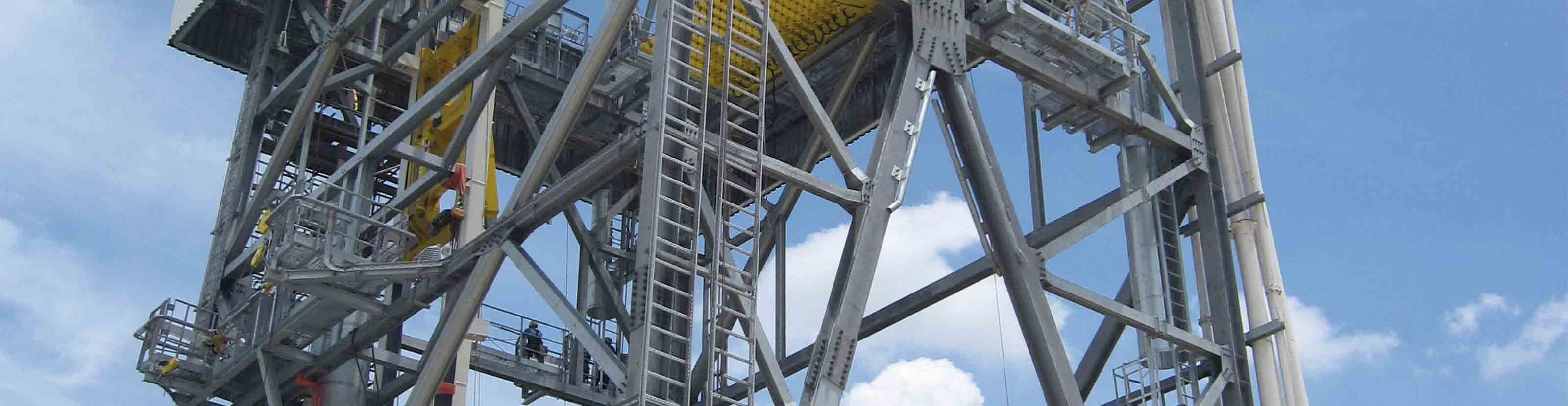 close-up of the metal structure of a drilling derrick