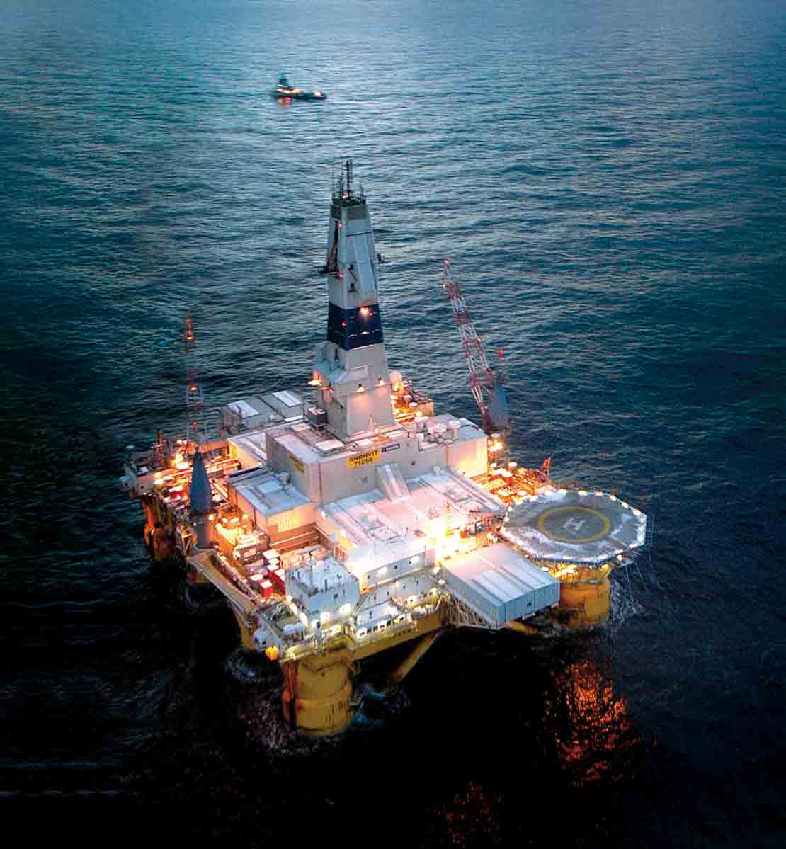 Offshore drilling platform in water.