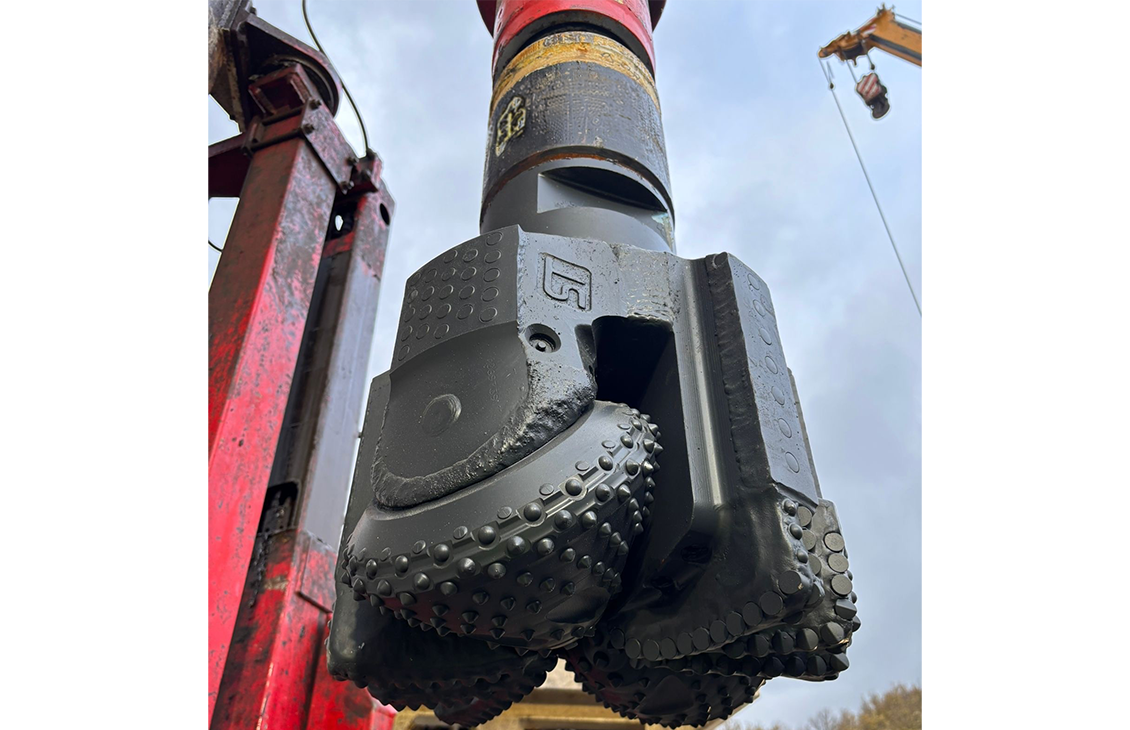 an image showing the Spyder hybrid drill bit on location at a geothermal well site