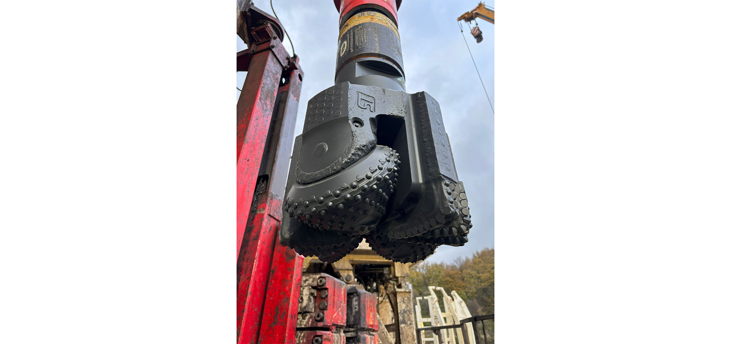 an image showing the Spyder hybrid drill bit on location at a geothermal well site