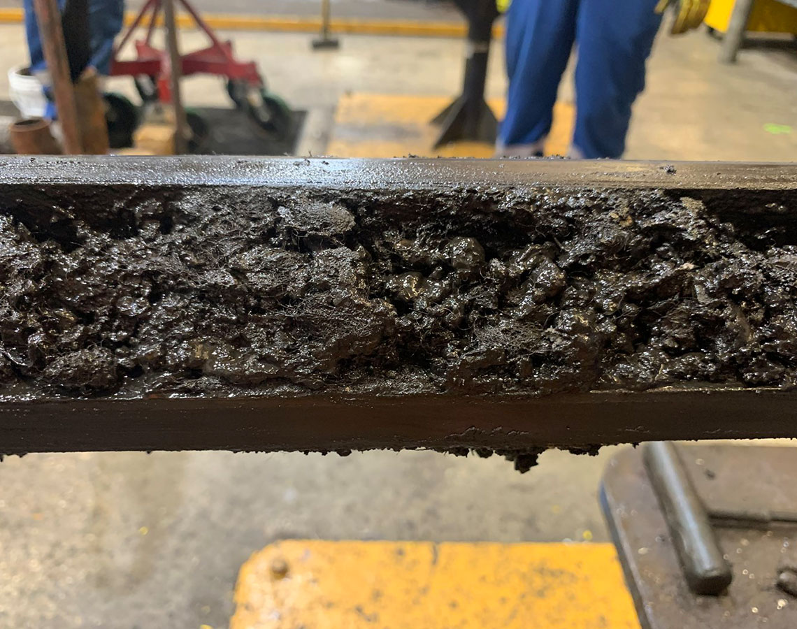 Photo of debris removed by the Mudgard Pro combination inline filter and magnet