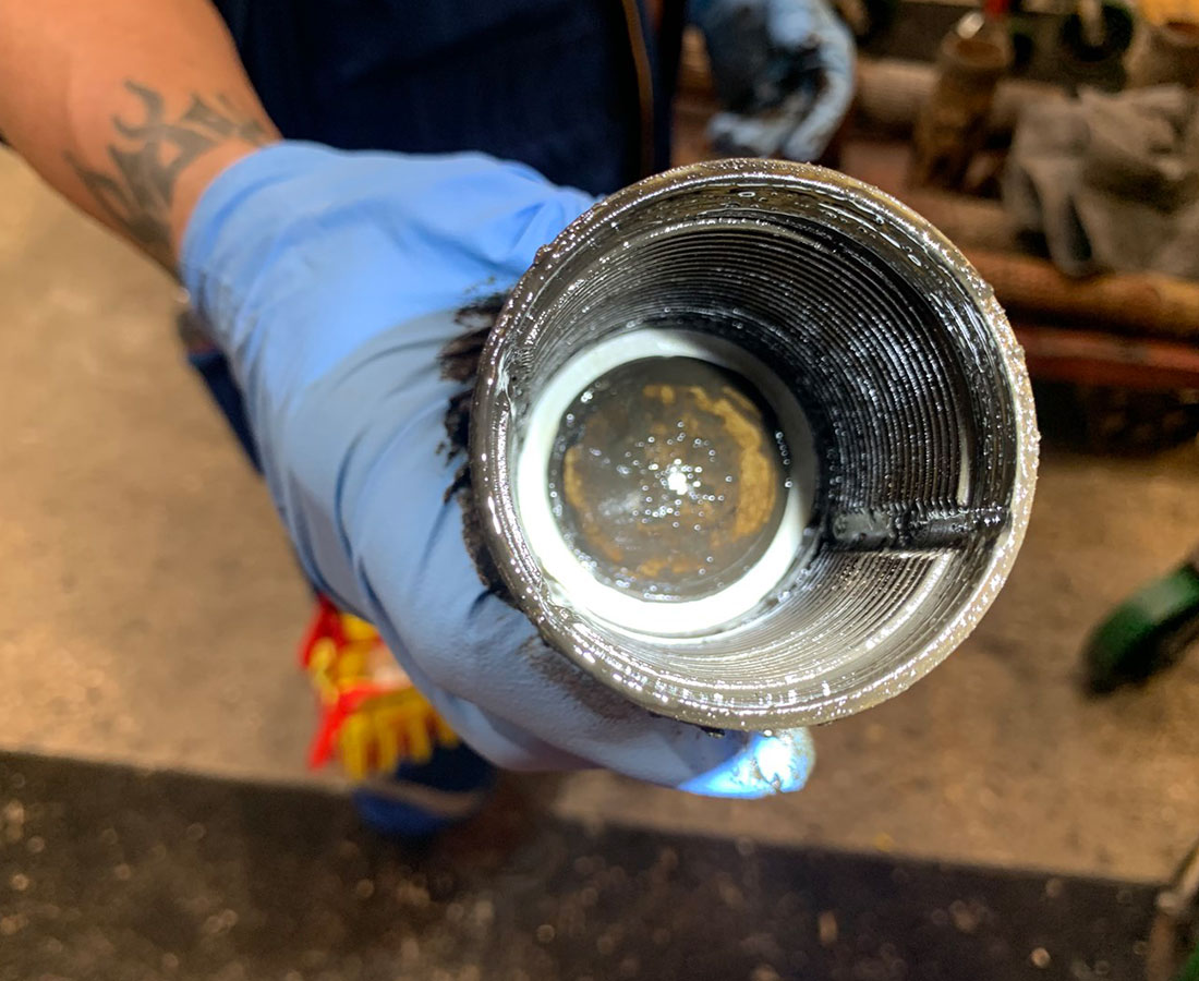 Photo of the Mudgard Pro combination inline filter and magnet.	
