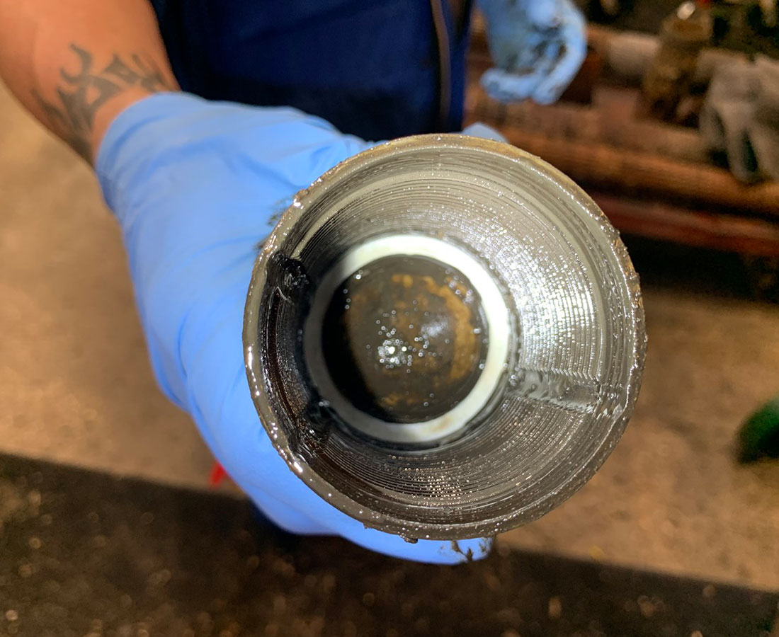 Photo of the Mudgard Pro combination inline filter and magnet.	