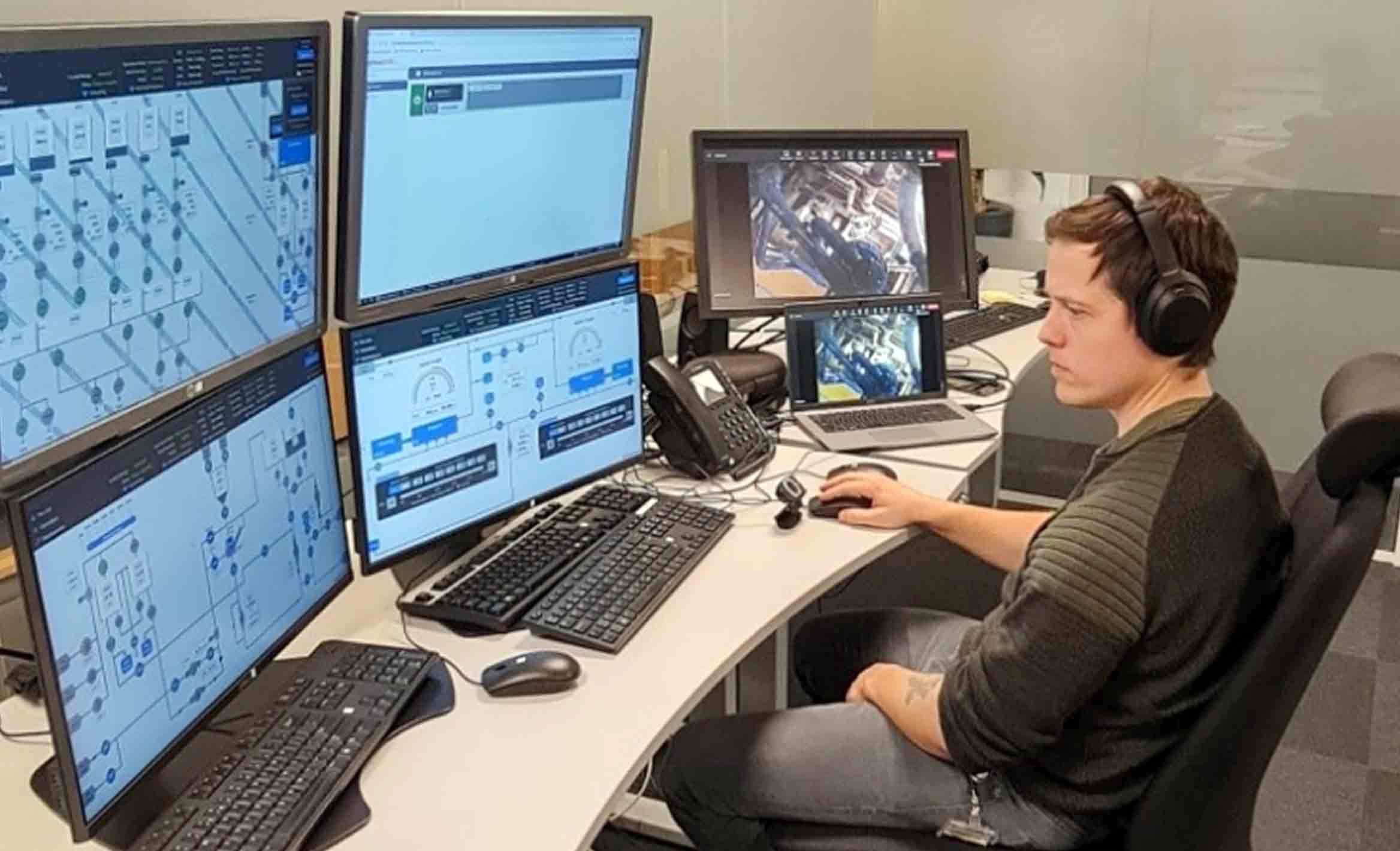 Photo of person conducting remote cementing job from Performance Live center.