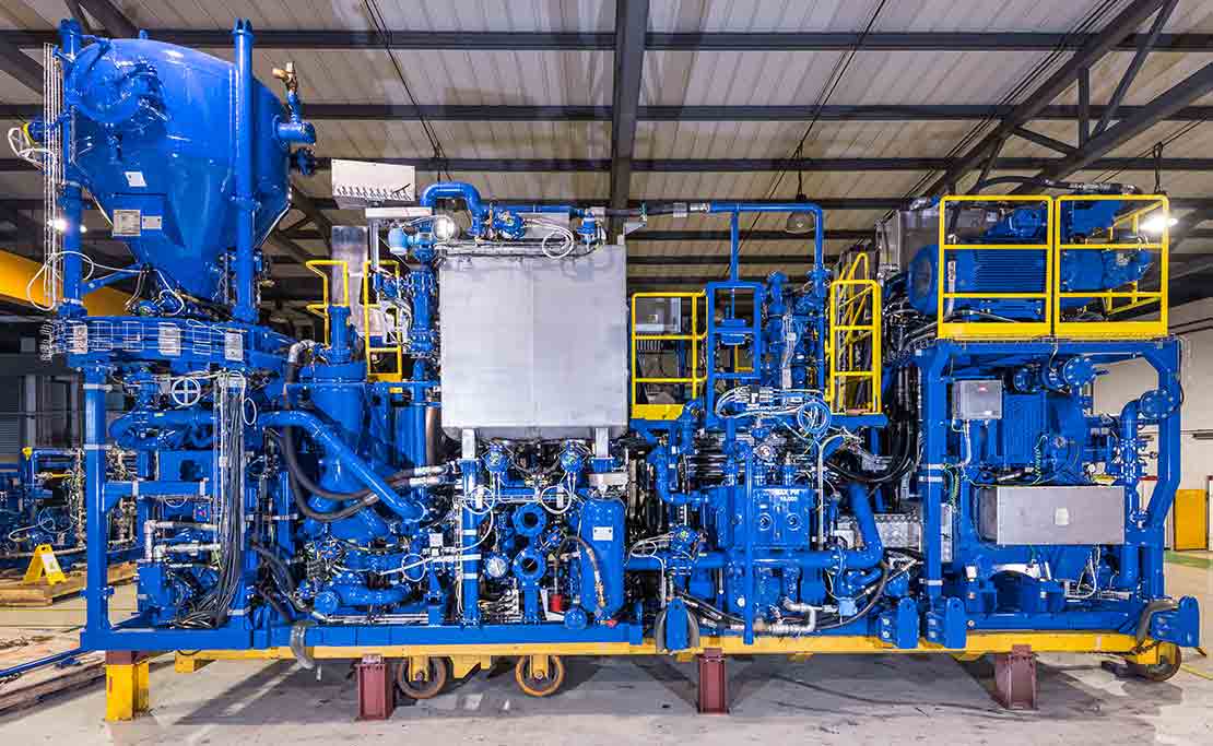 A CPS 730 cement pumping skid inside a manufacturing facility