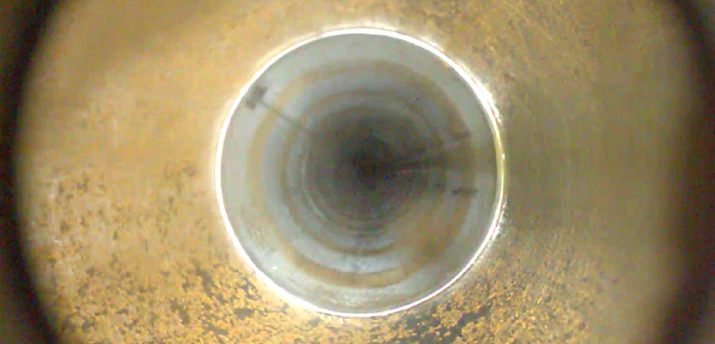 Internal view of expanded casing patch with the camera positioned just above it.