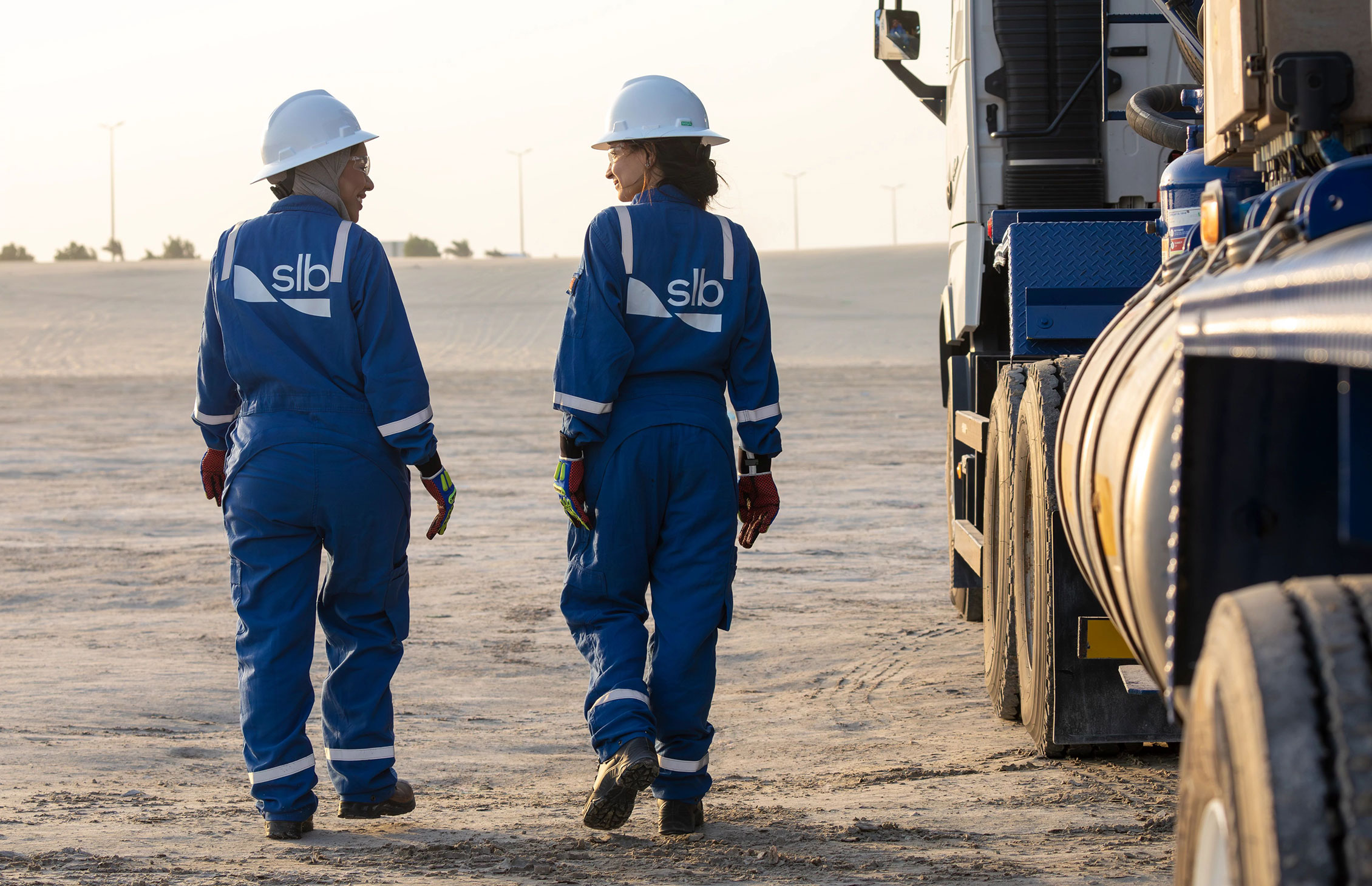 hero image - two workers walking