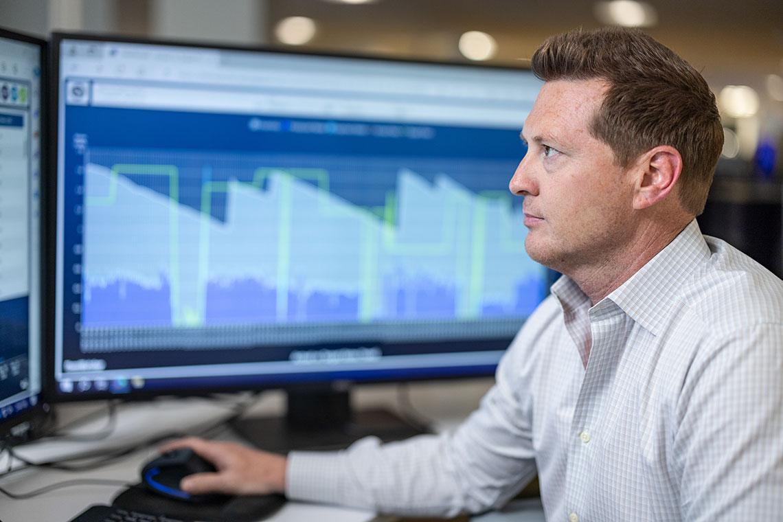 Male office worker  using a computer