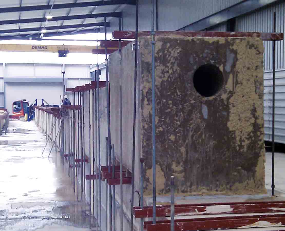 Testing the PowerDrive Archer RSS by drilling horizontally through several hundred feet of connected, large stone blocks in a Schlumberger facility