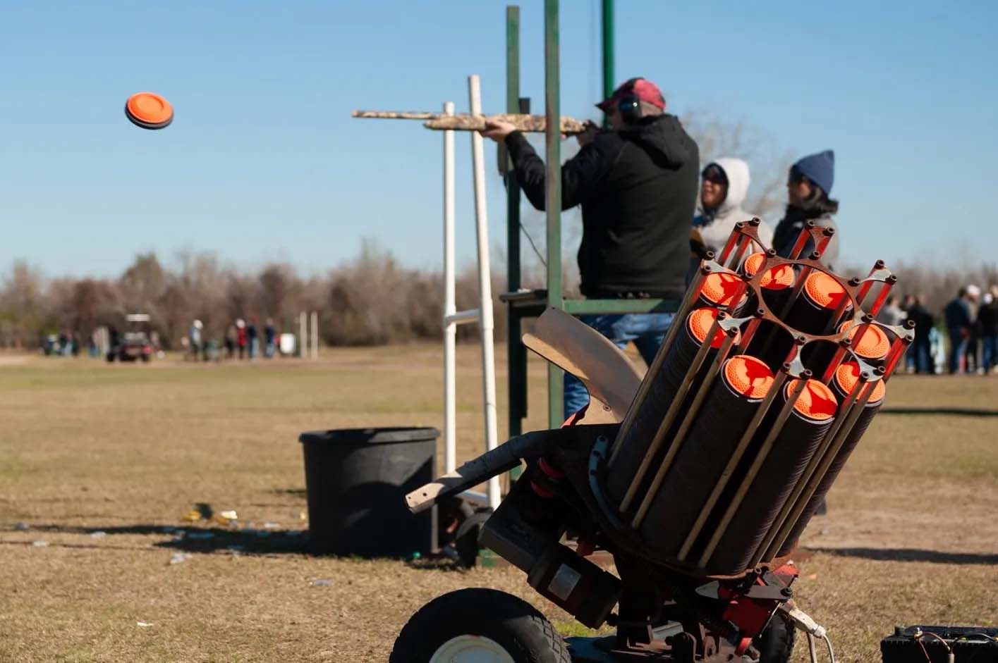 A person shooting a clay