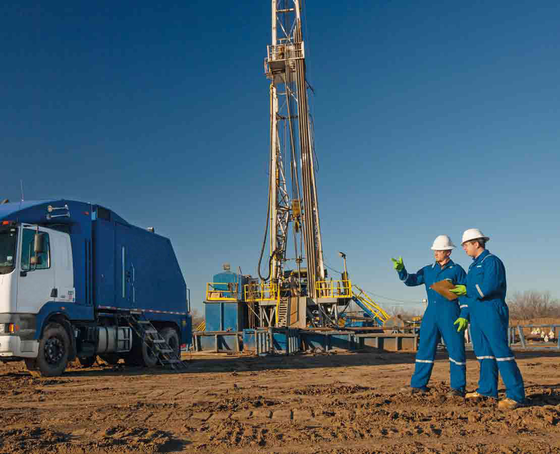 Two workers in the field.