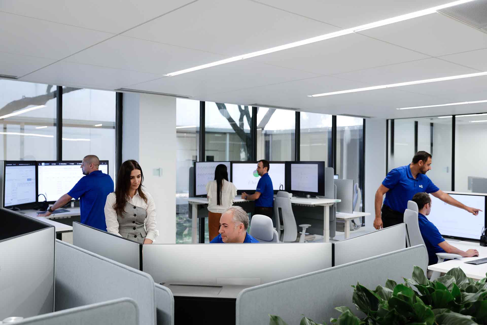 A data center office with employees working together