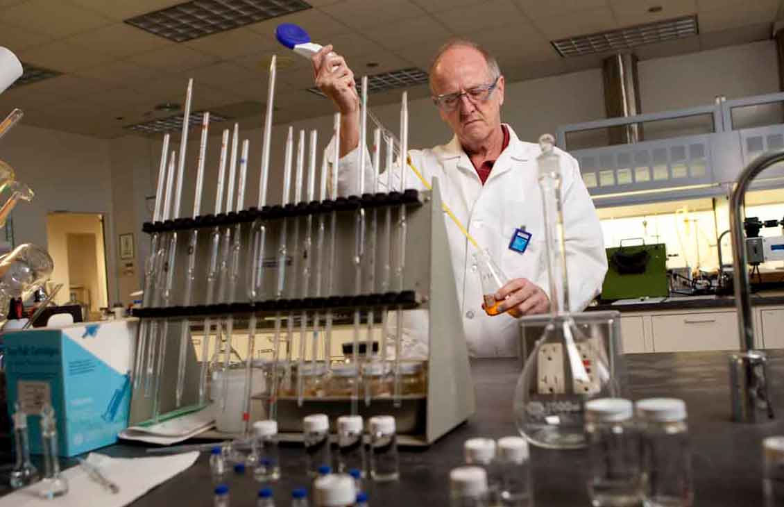 Lubricants with worker in lab