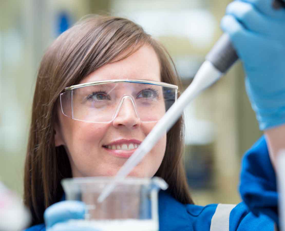 Lab worker testing fluids