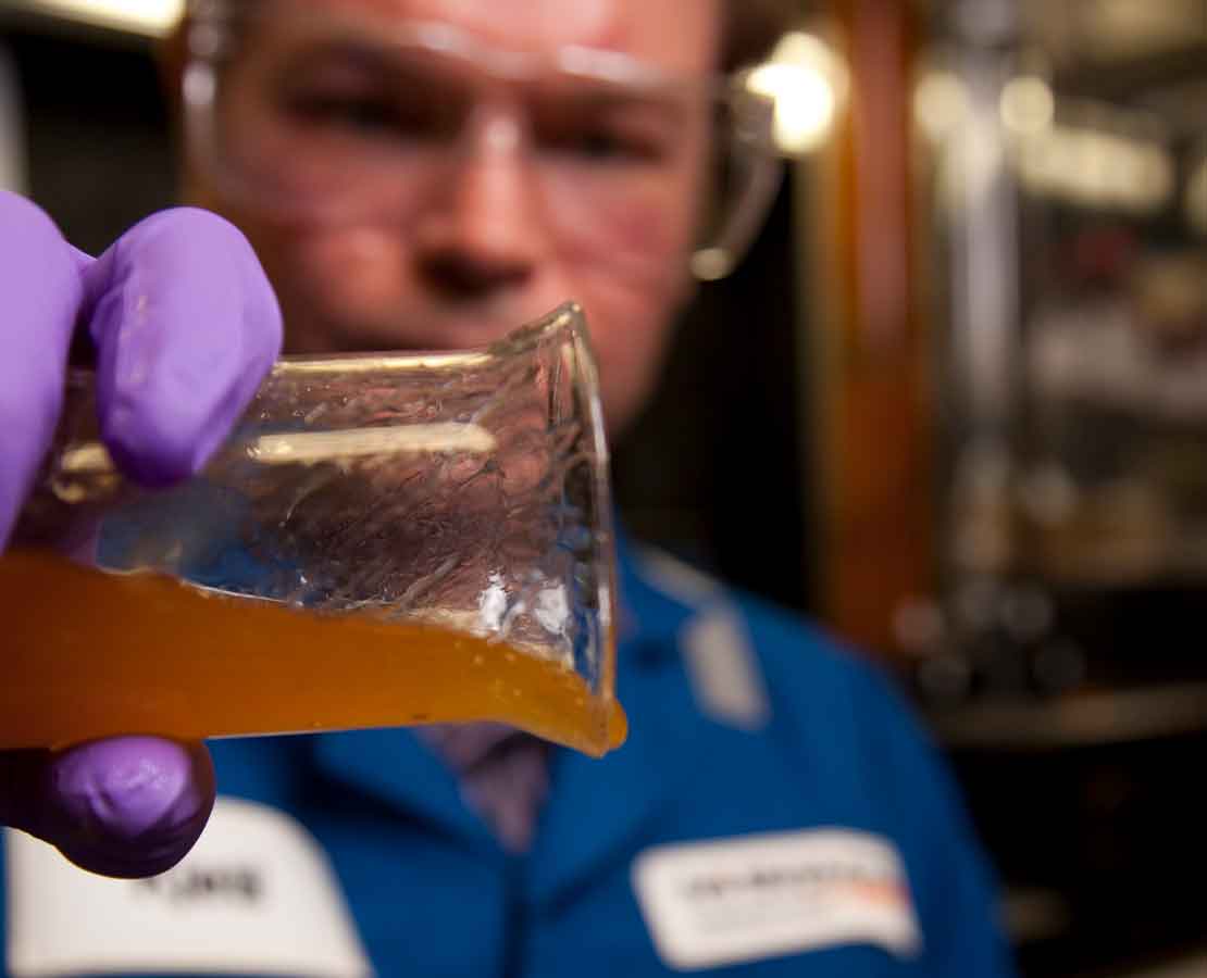 Worker testing ISOTHERM packer fluid