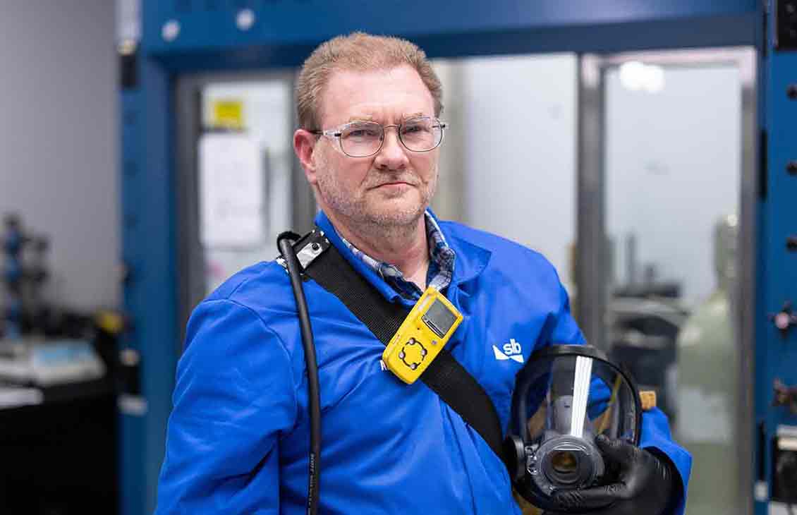 Photo of a man in PPE for H2S environment