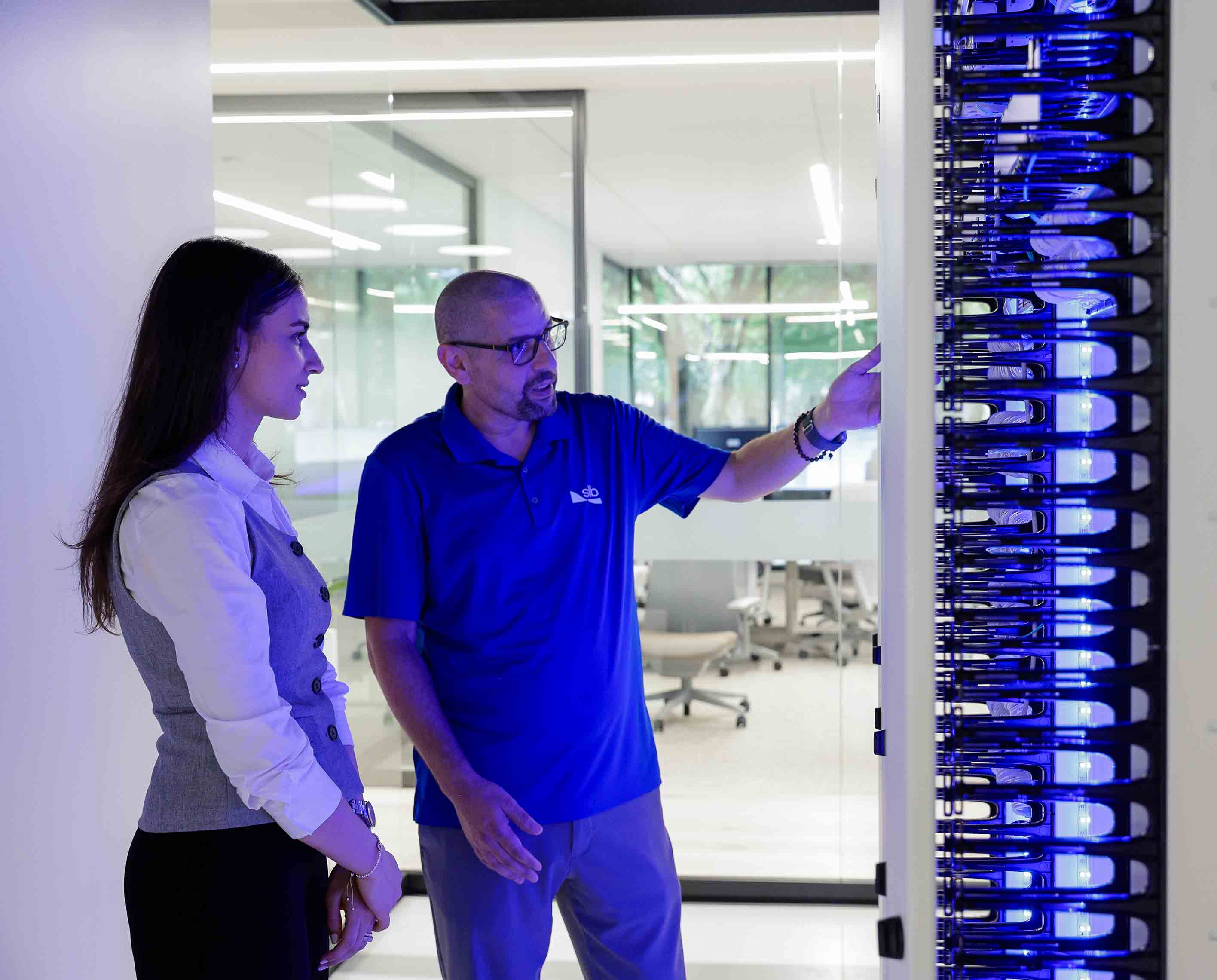 An image of people in a data center