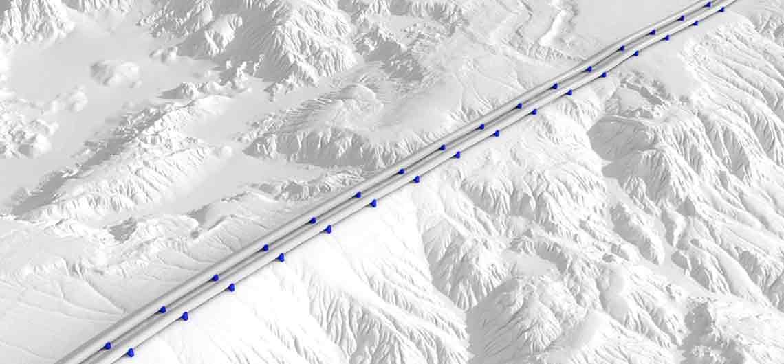 Mostly white artwork shows 2 pipelines crossing rugged mountainous terrain.