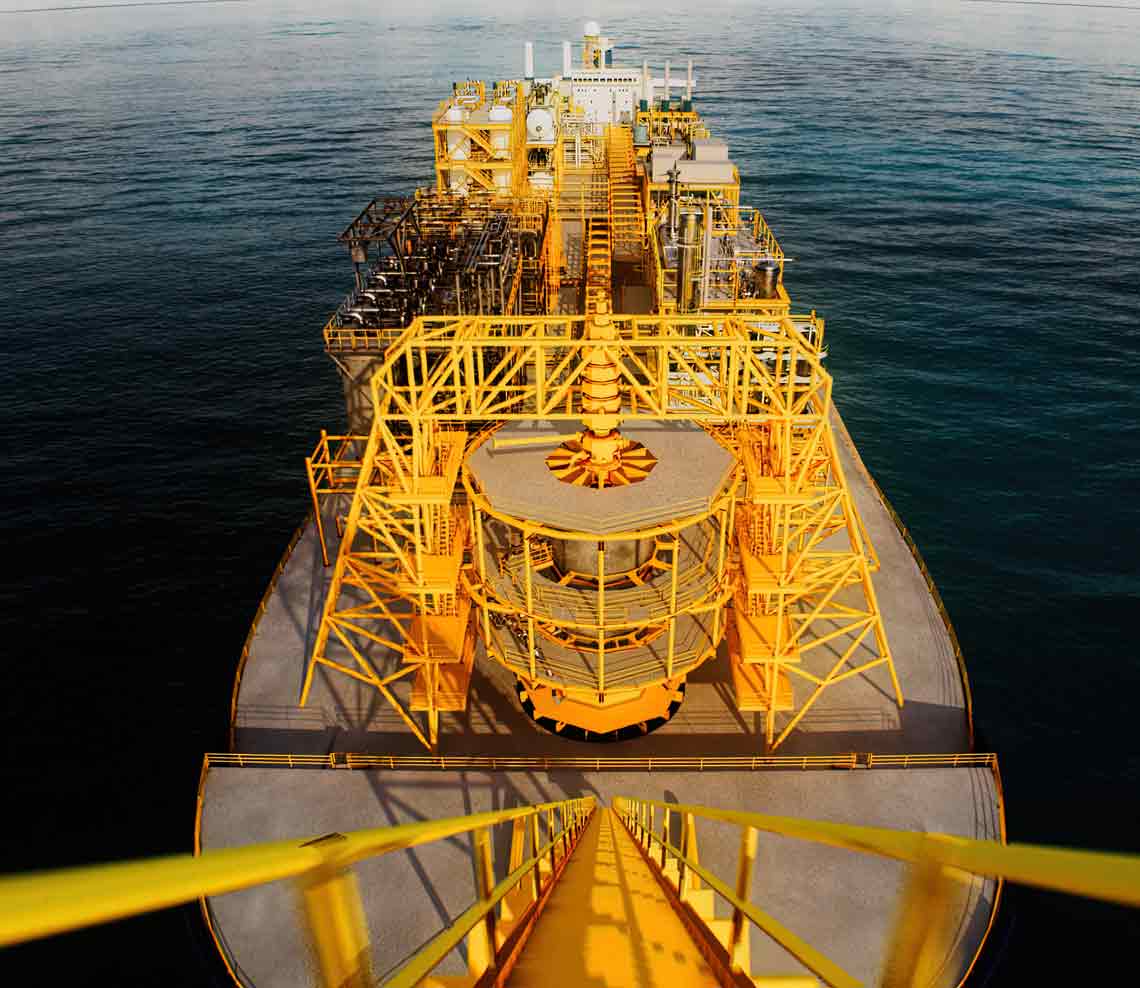Image of FPSO at sea from vantage point looking down from the flare tower on the bow
