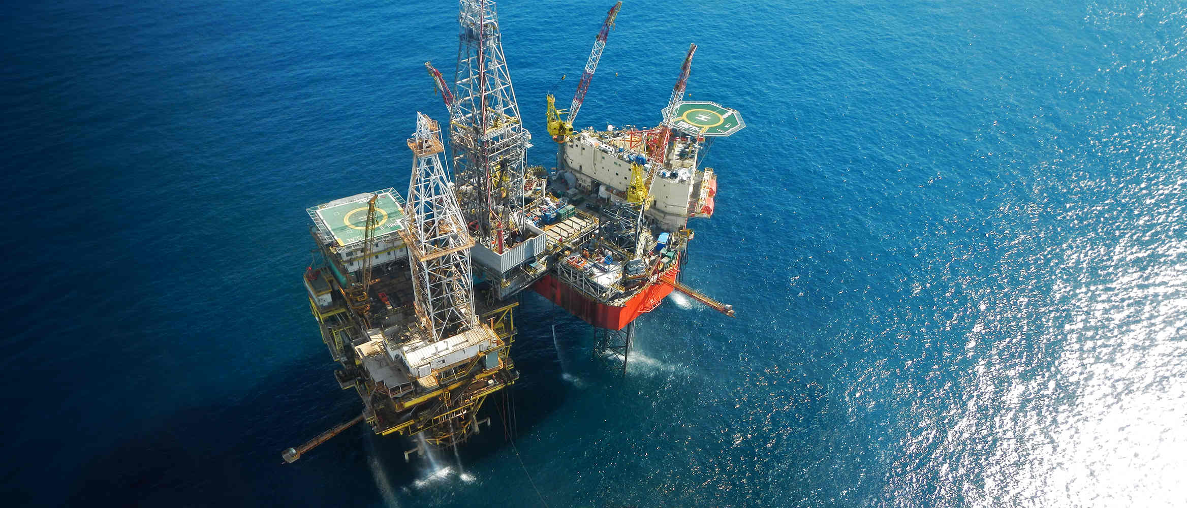 PEMEX offshore rig with Onel Alfa supporting production structure and La Santa Maria jackup.
