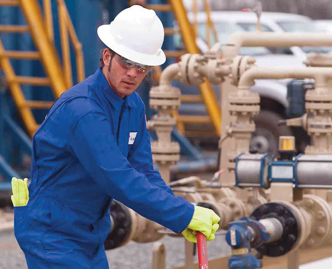 Schlumberger Worker Performing Maintenance on an Emergency Shutdown Valve