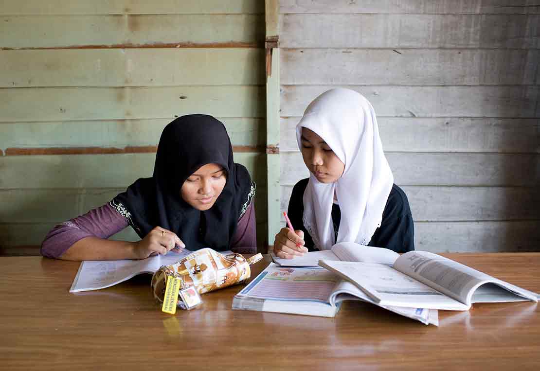 Two schoolgirls in Southeast Asia.
