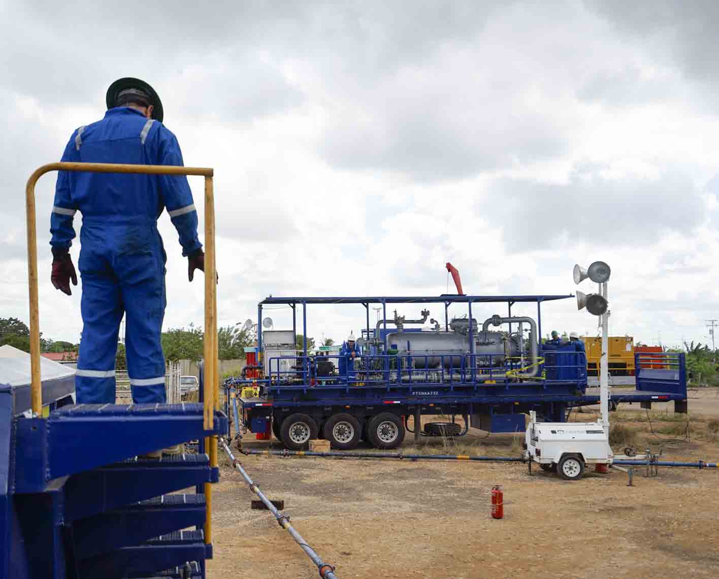 Photo of man looking at testing equipment