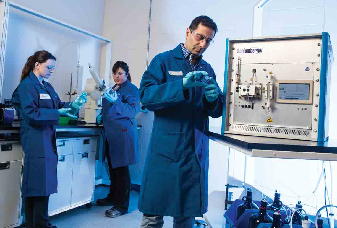 Schlumberger technicians using the Maze Microfluidic SARA Analysis.