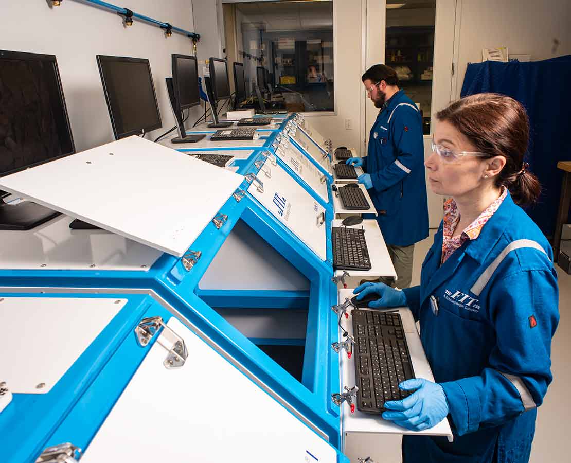 Worker in Fluid Inclusion Technologies lab.