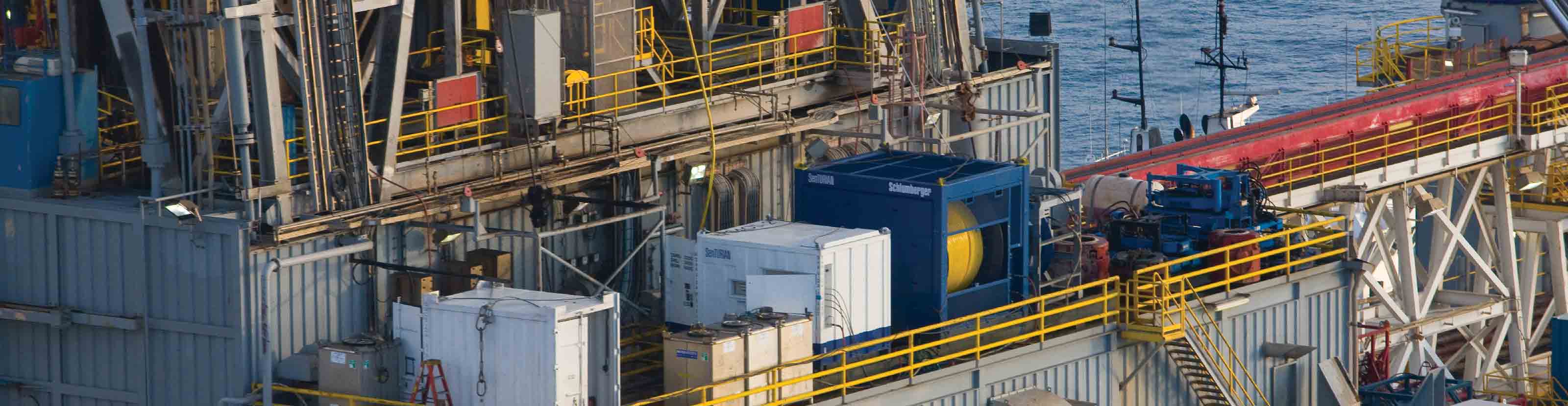 Offshore rig showing Schlumberger equipment.