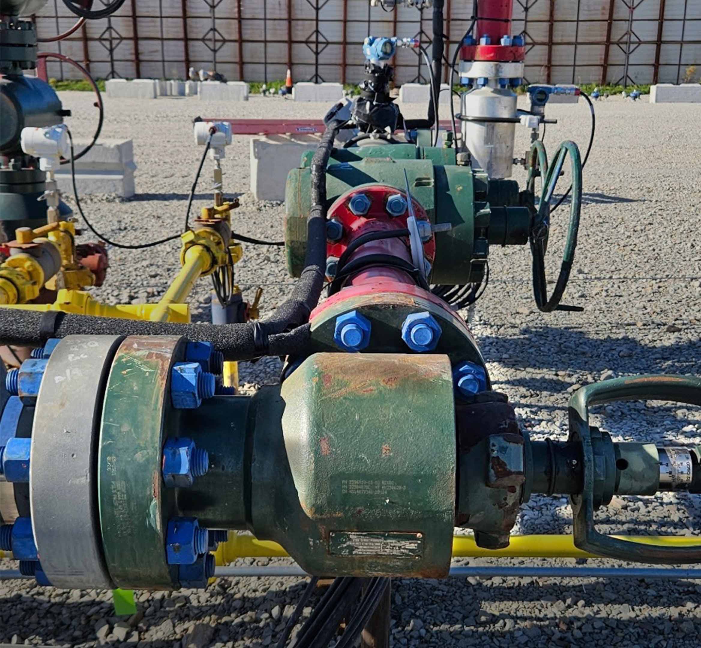 Photo of a CAM20-MT surface production choke, fitted with Invincible trim choke trim, at the wellsite.