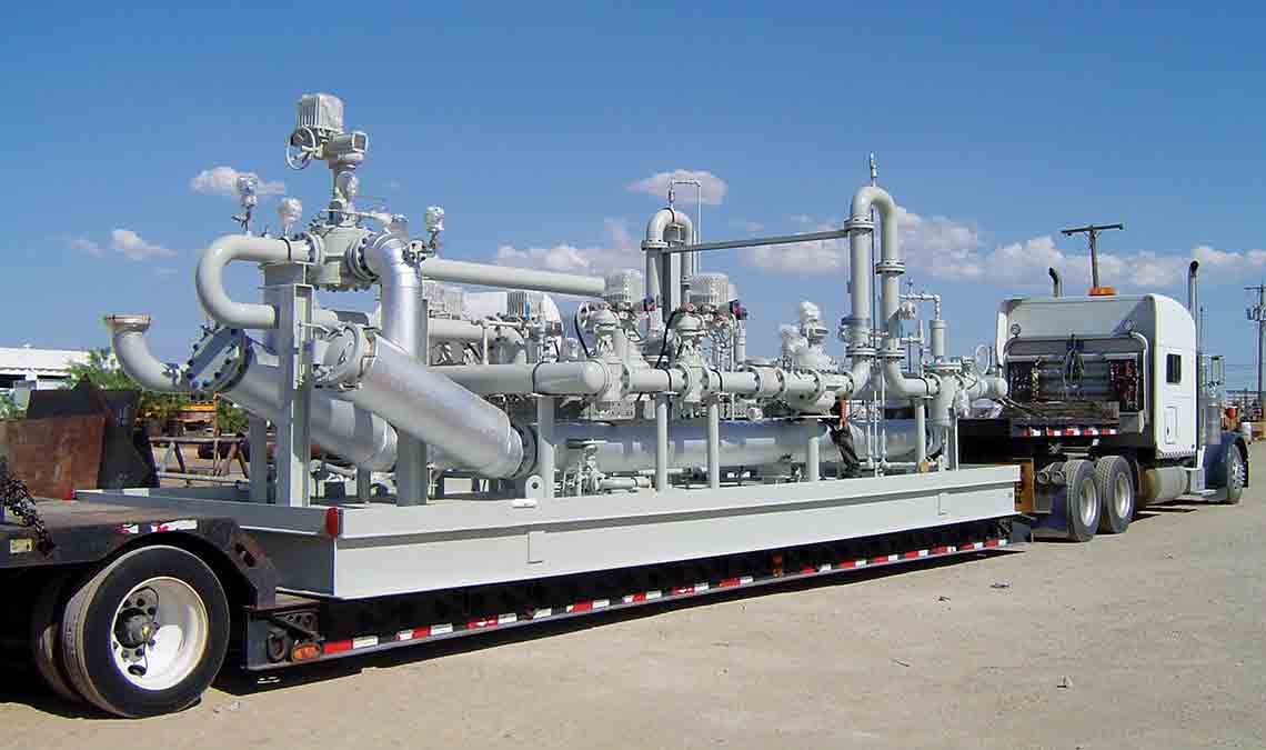 Photo of a pipeline metering system skid on a tractor trailer.