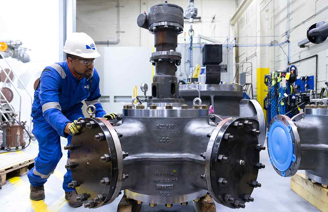 SLB operative in the workshop with a General Valve Four-Way diverter valve.