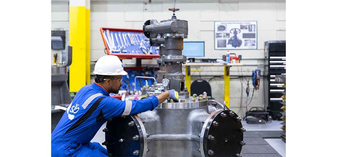 SLB operative in the workshop with a General Valve Four-Way diverter valve.