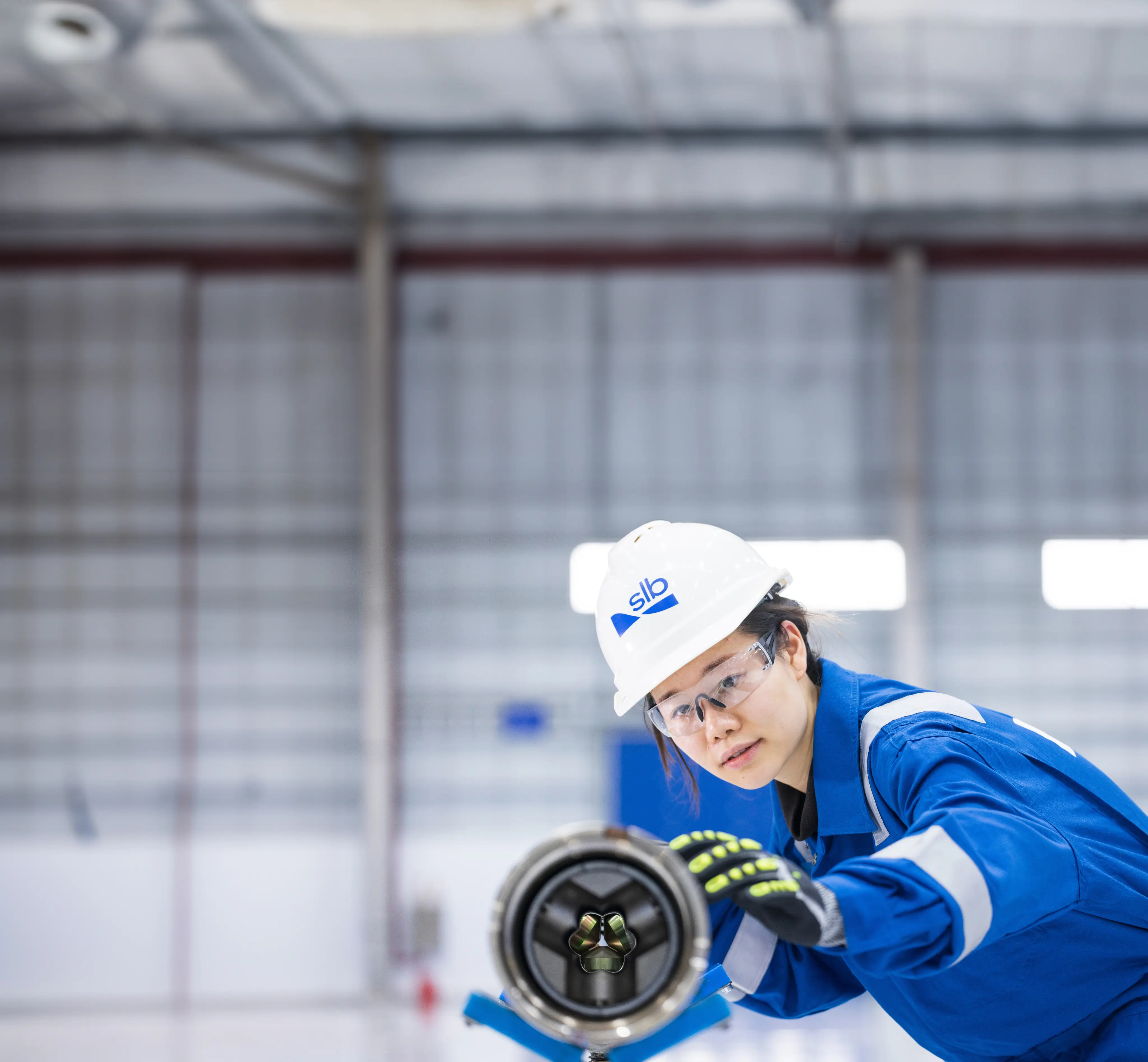 Woman in front of a waterfall
